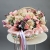 Композиция в корзине "Диодора" из французских роз Квиксенд, диантусов и кустовых пионовидных роз Бомбастик в Лобне